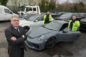 PCC Simon Foster and police officers from the Commercial Vehicle Unit Mitch Harvey (taller) and Jim Barry.