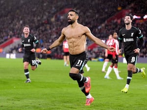 Mohamed Salah celebrates scoring their side’s third goal of the game during the Premier League match at Southampton