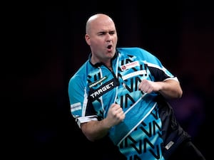 Rob Cross reacts during the World Darts Championship at Alexandra Palace in London