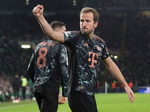 Bayern Munich striker Harry Kane celebrates his goal against Celtic.