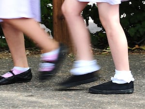 Girls walking to school