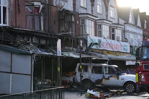 Emergency services at the scene of a fire at a mixed commercial and residential premises on Stratford Road in Sparkhill, Birmingham. Photo: Jacob King/PA Wire