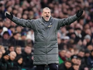 Ange Postecoglou throws his arms up in despair on the touchline during Tottenham's 2-2 draw with Wolves