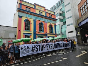 Wolves and Brighton fans protest before their match at the Amex