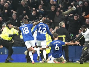 James Tarkowski slides on his knees to celebrate his goal