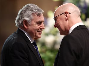 Former prime minister Gordon Brown (left) and Scottish First Minister John Swinney