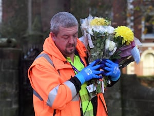 Flowers and other tributes left at the memorial were moved 