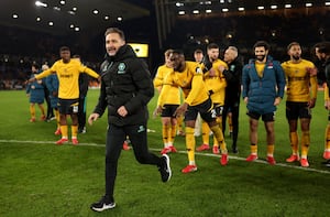 Vitor Pereira, Manager of Wolverhampton Wanderers, celebrates following the team's victory during the Premier League match between Wolverhampton Wanderers FC and Aston Villa FC a (Photo by Jack Thomas - WWFC/Wolves via Getty Images)