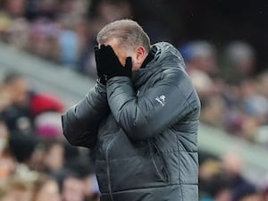 Tottenham manager Ange Postecoglou reacts on the touchline at Villa Park