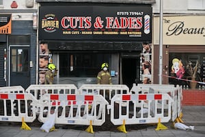 Fire crews outside Cuts and Fades on Saturday 