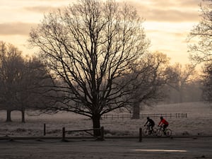 Cyclists at sunrise