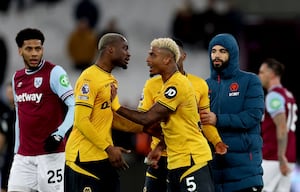 Mario Lemina clashes with team-mate Toti Gomes (Photo by Alex Pantling/Getty Images)