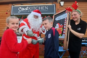 Youngsters were enjoying afternoon tea with Santa at Stack Kitchen at Baggeridge. Staff member Holly Richards and Santa are pictured with Nellie and Jaxon Evans