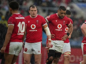 Wales players react