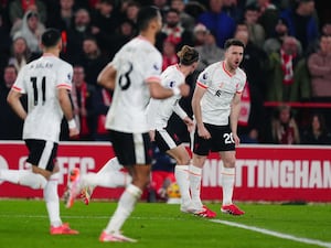 Diogo Jota, right, celebrates after scoring Liverpool’s equaliser against Nottingham Forest