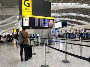 A passenger at Terminal 5 of Heathrow Airport, London