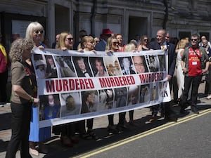 Victims and campaigners outside Central Hall in Westminster