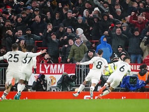 Lisandro Martinez, right, celebrates after scoring Manchester United’s first goal