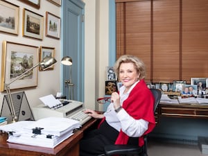 Barbara Taylor Bradford at a typewriter