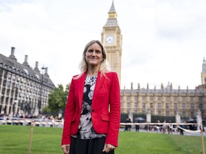 Labour MP Kim Leadbeater standing in front of the Houses of Parliament