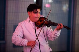 Opening night of the Birmingham Christmas Market. Street Entertainer.