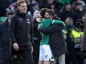 Plymouth head coach Miron Muslic (right) hugs goalscorer Ryan Hardie after the win over Liverpool