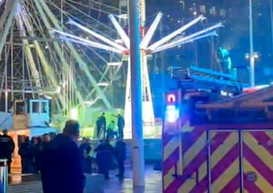 Emergency services attend the scene at the Star Flyer ride at the Christmas fairground in Centenary Square, Birmingham, on Thursday evening, December 12, 2024.  =