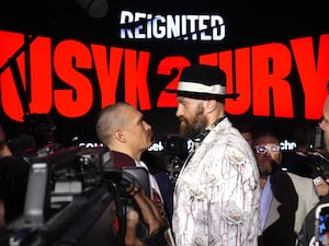 Oleksandr Usyk (left) and Tyson Fury face off ahead of Saturday's fight