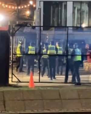 Team of police officers respond to scene as thrill-seeker jumps off a Birmingham tower block. 