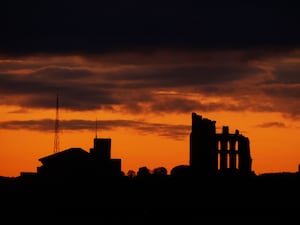 Dawn breaks over Tynemouth Priory in North Shields