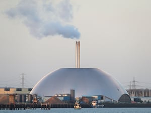 A general view of the Marchwood ERF incineration plant in the Port of Southampton. It is a dome with two chimneys rising from the top of the building.