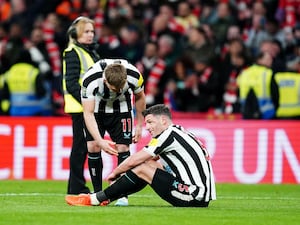 Matt Ritchie (left) and Fabian Schar appear dejected