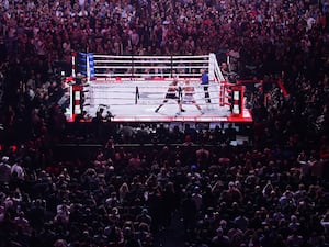 Mike Tyson, left, fights Jake Paul during their heavyweight boxing match in November in Arlington, Texas