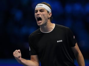 Taylor Fritz celebrates beating Alexander Zverev