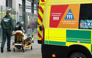 A row of ambulances parked outside Queen Elizabeth Hospital, Birmingham, on January 7, 2025. 