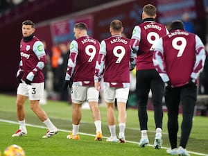 West Ham players wear the shirt of team-mate Michail Antonio