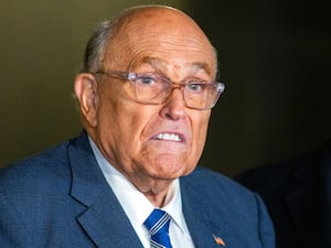 Rudy Giuliani speaks to the media outside Manhattan federal court