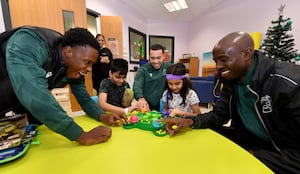 Walsall FC players met staff and patients at Walsall Manor Hospital and played games with them as well. Liam Gordon, Douglas James Taylor and Albert Adomah play games with Hasssan Malik, aged nine and Reet Basra, aged six.