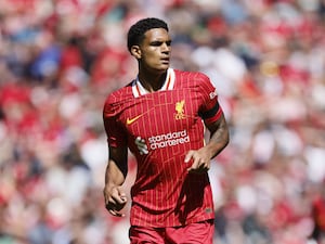 Liverpool defender Jarell Quansah looks on