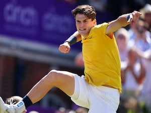 Jack Draper celebrates beating Carlos Alcaraz at Queen's Club