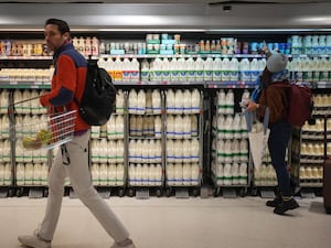 A shopper in a Waitrose store in Canary Wharf, east London