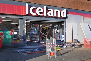 The frontage of the store was closed off the morning after the crash