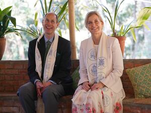 The Duke and Duchess of Edinburgh sit next to each other in Kathmandu