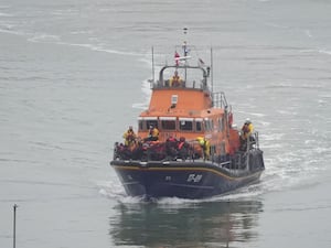 A group of people thought to be migrants are brought in to Dover, Kent, by the RNLI Dover Lifeboat following a small boat incident in the Channel