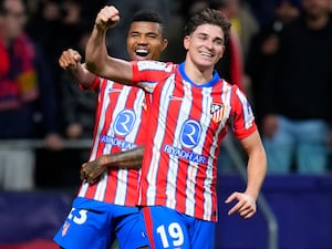 Julian Alvarez, front, celebrates after scoring against Bayer Leverkusen