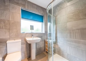 The bath and shower room at the house in Fairfield Drive, Codsall