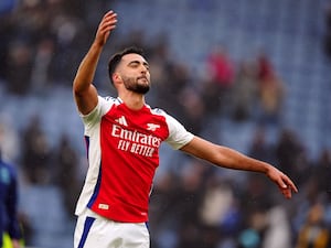 Arsenal’s Mikel Merino celebrates after the Premier League match Leicester