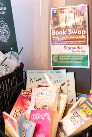 A book swap basket inside the new store. Photo: Starbucks