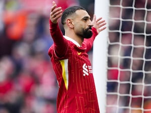 Liverpool’s Mohamed Salah celebrates scoring against Wolves