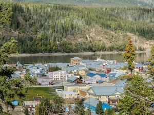 Aerial view of Dawson City in Canada with the Yukon River in background